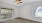 High ceilings with ceiling fans in apartment living rooms at Harbourtowne at Countrywoods